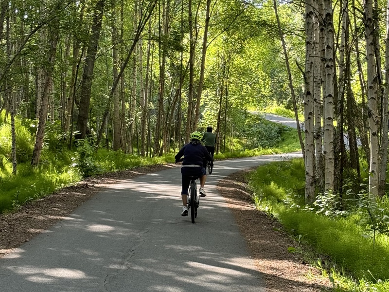 Couple biking on trail